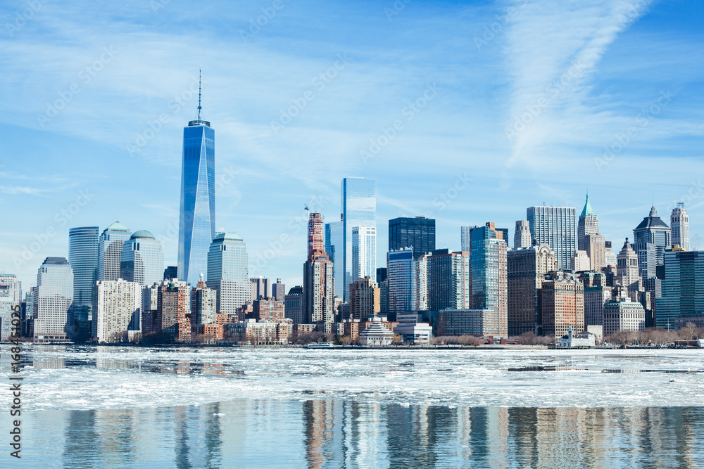Naklejka premium Frozen NYC Skyline; Rare Ice-covered Hudson River; Winter Polar Vortex 2015; Climate Change