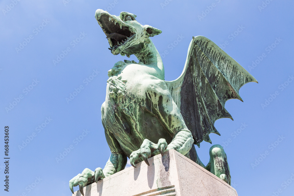 Dragon statue on the dragon bridge in Ljubljana, Slovenia
