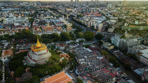  'Golden Mountain ' Wat Saket Ratcha Wora Maha Wihan popular Bangkok tourist attraction , Landmarks of bangkok Thailand . In the rain before , topview