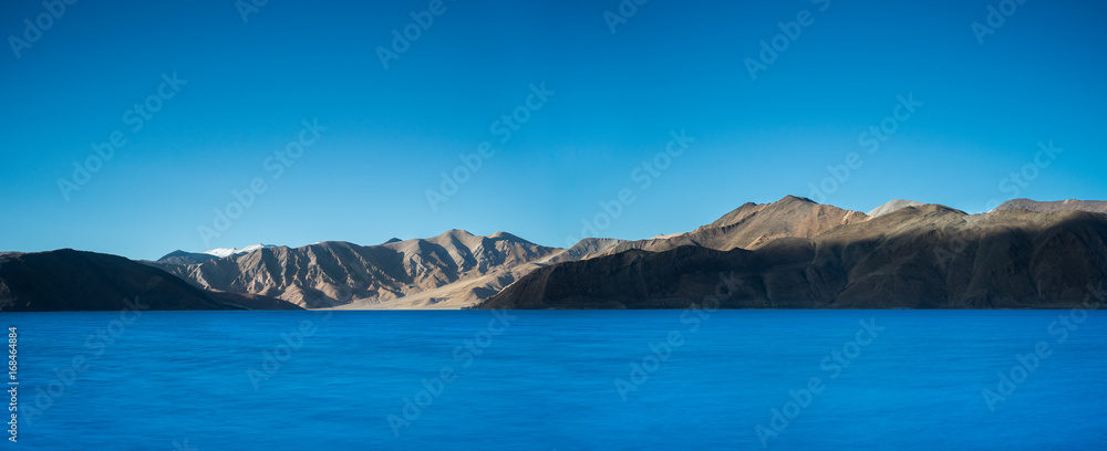 Panoramic shot of Pangong lake with clear sky, Ladakh, India