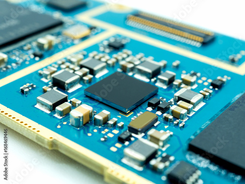 Closeup image of microprocessor on electronic circuit board. Shallow DOF.