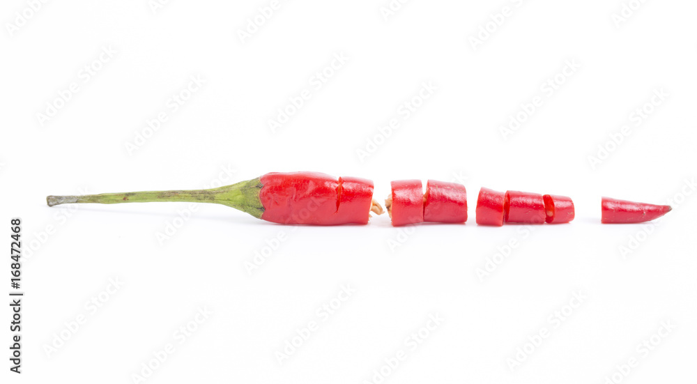 Red chopped chili on white background. Red chopped chili on white background.