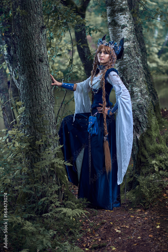 Valkyrie warrioress in magpie costume. Styling for the Scandinavian women's costume of the Viking Age.