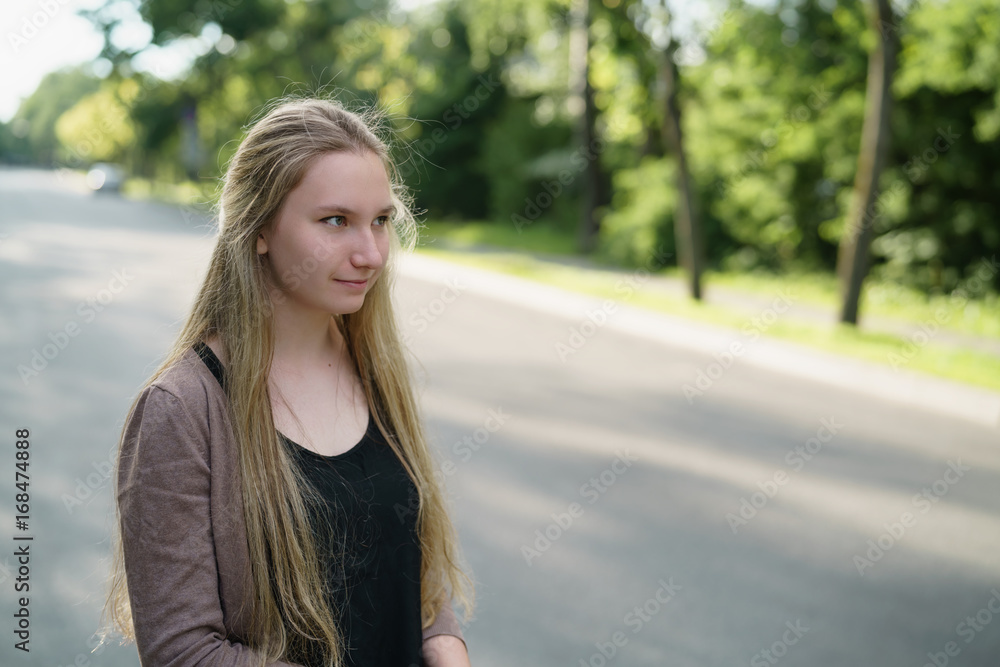 teen girl portrait in town in sunny summer day teen girl portrait in town in sunny summer day