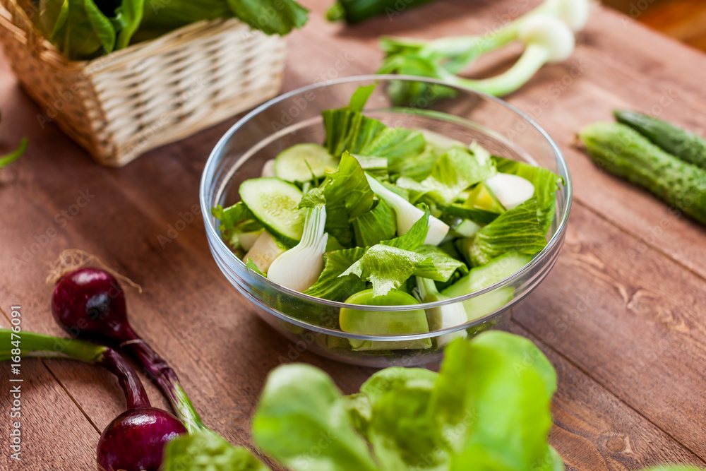 vegetable green salad bowl on kitchen table, balanced diet vegetable green salad bowl on kitchen table, balanced diet