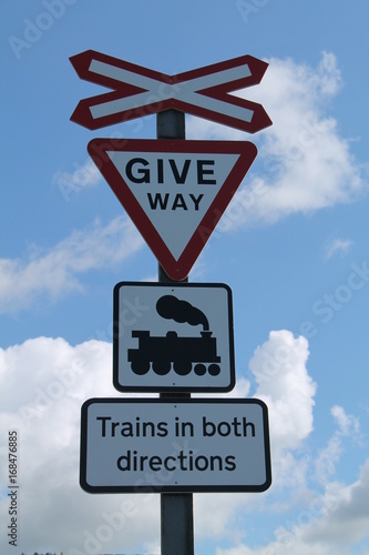 Obraz na plátně The Warning Signs at a Train Railway Level Crossing.