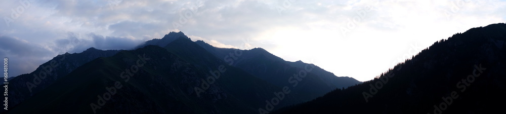Panorama of the dawn in the mountains