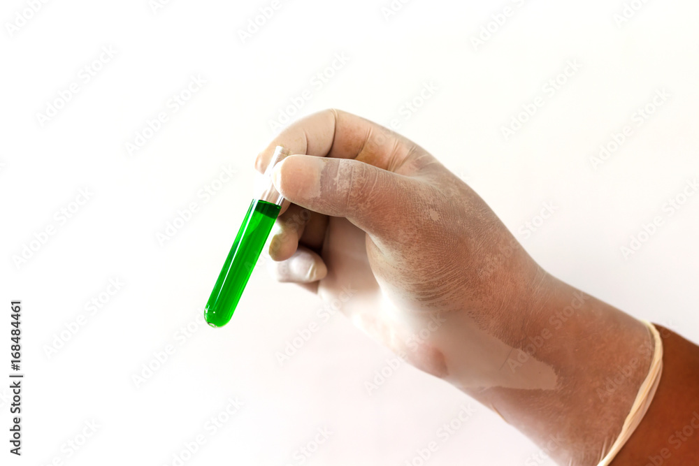 Scientists holding a test tube on a white background. Scientists holding a test tube on a white background.