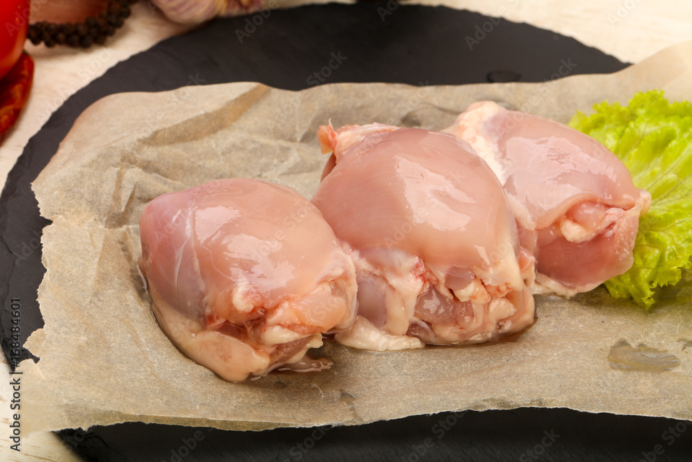 Boneless raw chicken thighs