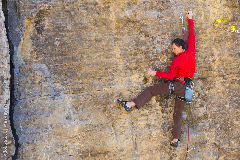 climber climbs the rock..