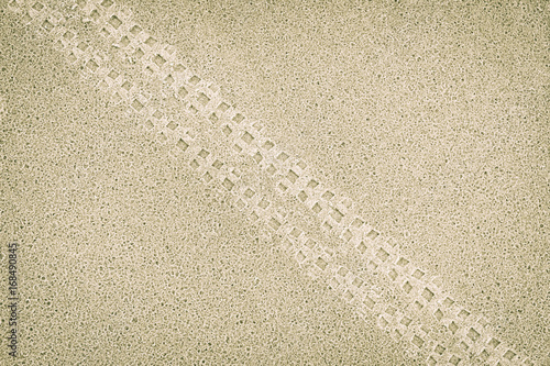 Bicycle tracks in the sand