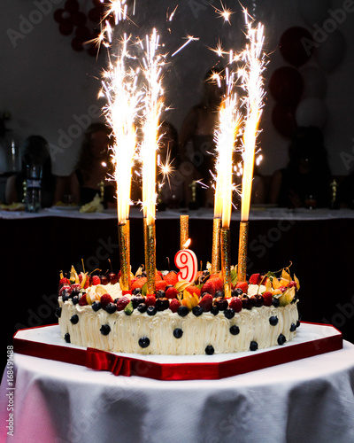 Delicious cake with  fireworks.