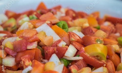 Macro shot of chopped vegetables in english salad