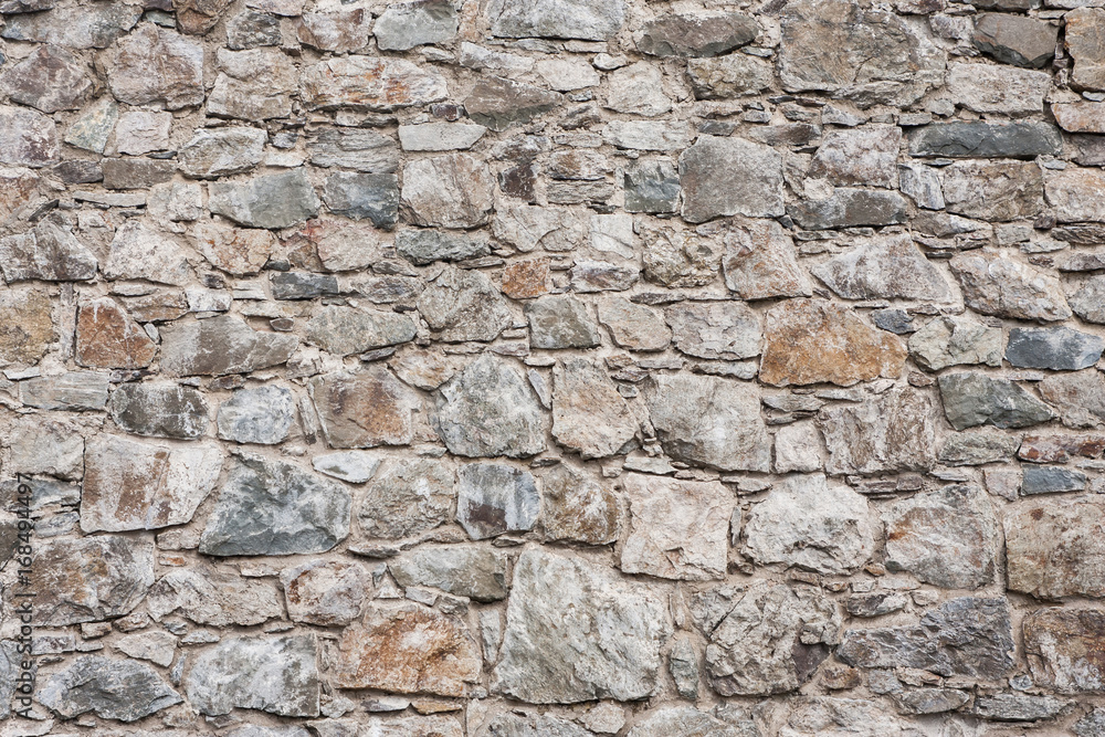 Gray rocky stone blocks pattern. Caste wall background.