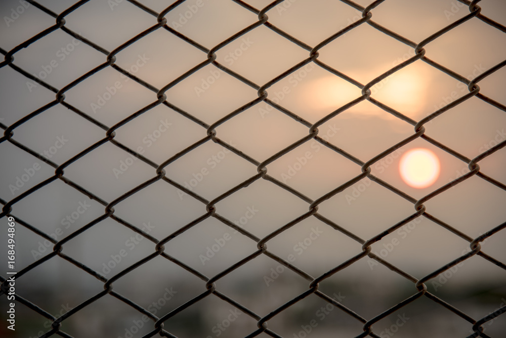 Fototapeta premium Steel grating sunset background.