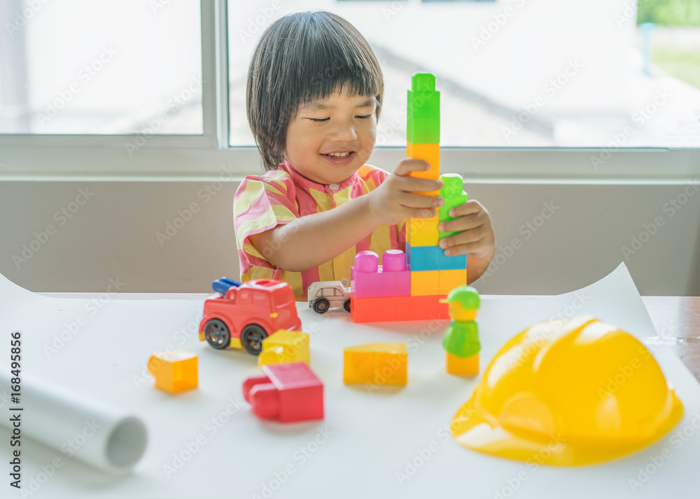 Kids Play Room, Child playing building blocks toys, Development and construction concept Kids Play Room, Child playing building blocks toys, Development and construction concept