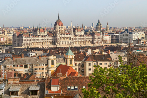 View of Hungarian Parliament building over the city roofs