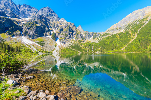 Fototapeta Naklejka Na Ścianę i Meble -  View of Morskie Oko lake with emerald green water in summer season, High Tatra Mountains, Poland