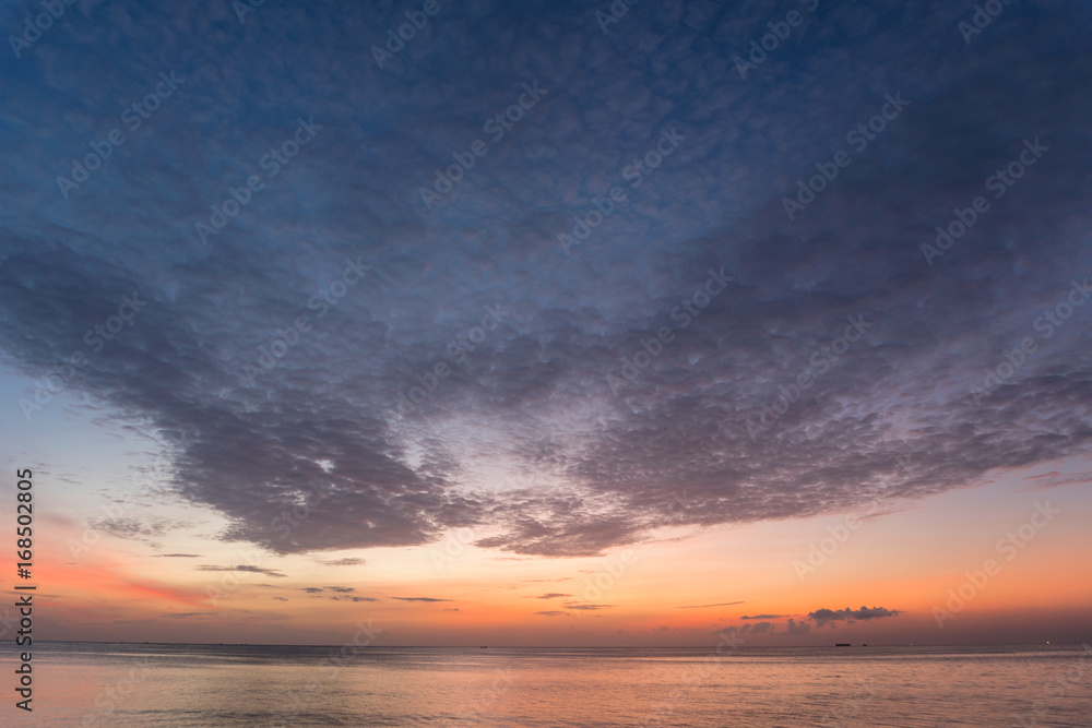 dramatic sky and clouds sunrise over tropical sea in phuket thailand