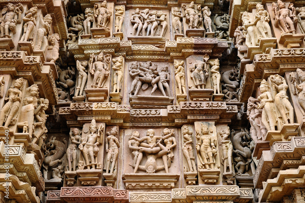 India, Sculptures religious erotic sybmboli of the Indian faith on walls of temples in Khujaraho temples. Madhya Pradesh India, Sculptures religious erotic sybmboli of the Indian faith on walls of temples in Khujaraho temples. Madhya Pradesh