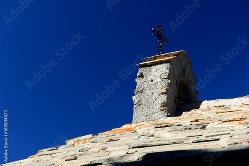Cross on the rocky church