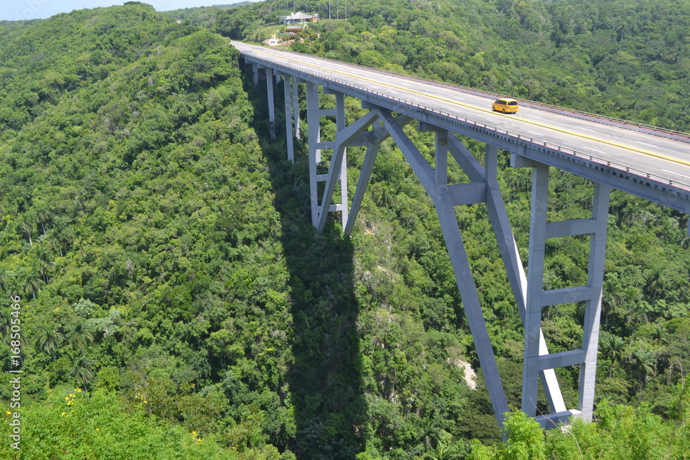 Taxi on Crossing Bridge in the Cuban Country Taxi on Crossing Bridge in the Cuban Country