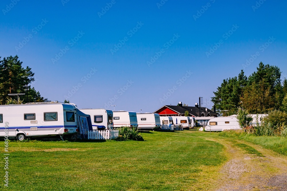 Camping life with caravans in nature park Camping life with caravans in nature park