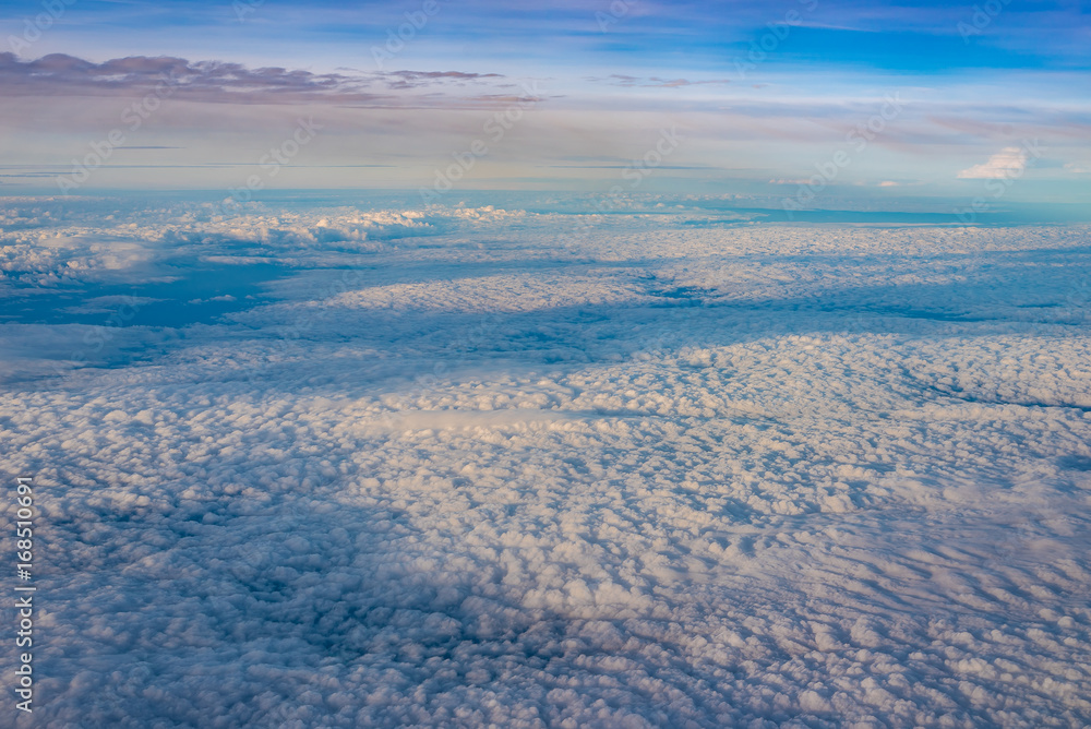 The Altocumulus cloud formation view from aircraft window