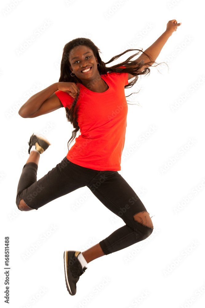 Active young woman dancer jumps in the air isolated over white background