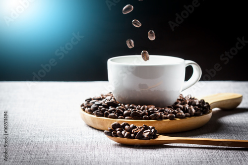 Coffee beans Fall into a coffee cup