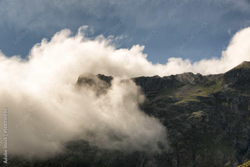 Clouds on the mountain in the alps