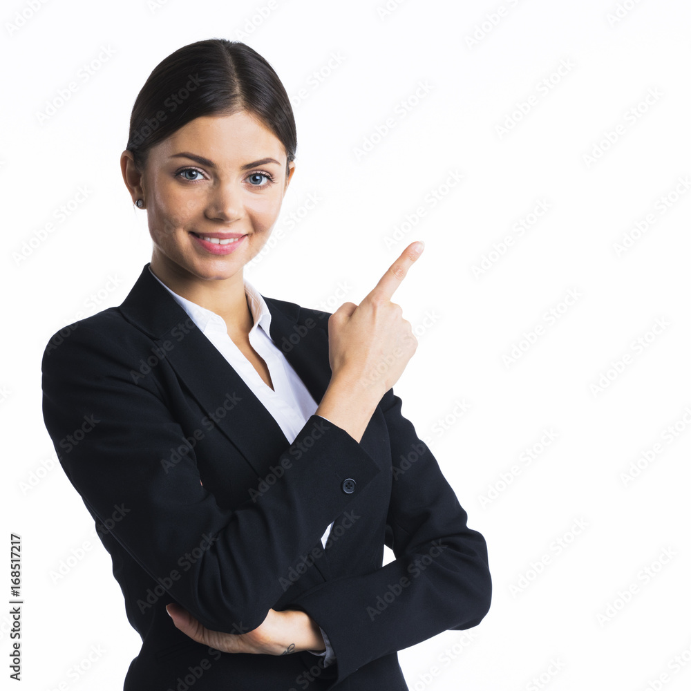 Business woman pointing at copyspace Business woman pointing at copyspace