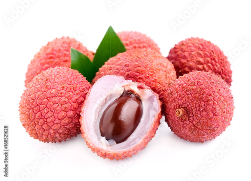 Sweet lychees fruits with leaves .