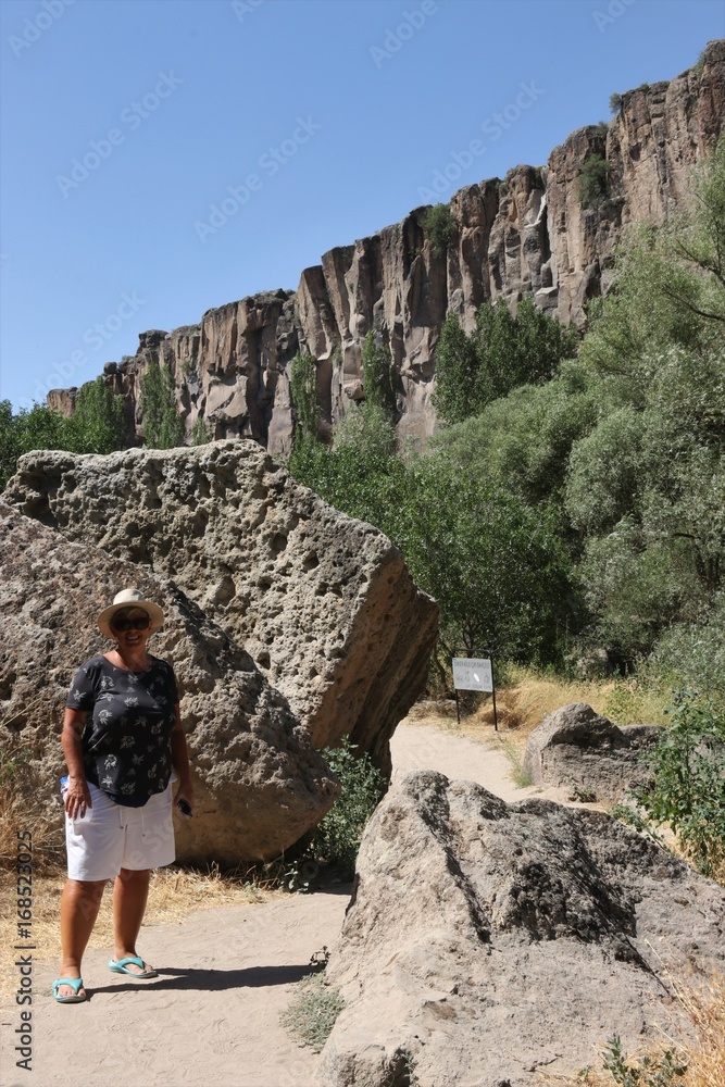 Naklejka premium 24TH JULY 2017, An english tourist in the Ihlara Valley, which is a 16 km long gorge cut into volcanic rock in the southern part of Cappadocia Turkey, 24th july 2017