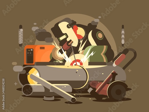 Man welder in mask