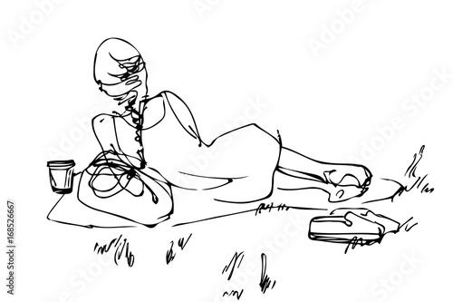 picnic girl resting lying on the grass