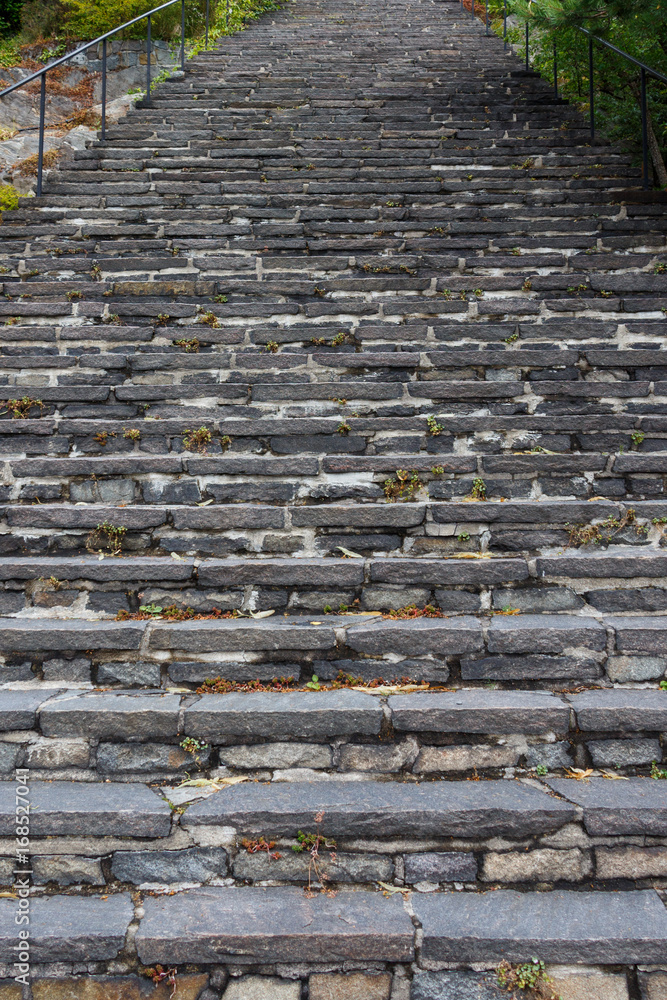 Natural gray stone stair walkway lead up to town Natural gray stone stair walkway lead up to town