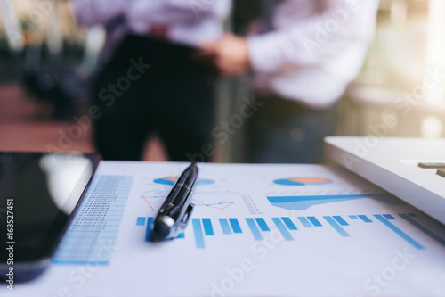 Teamwork process, Close up of pen, Blurred abstract background of Business people meeting