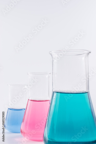 science and clinic background. Chemical and Medical laboratory research. laboratory beakers with colorful liquids and reagents. 