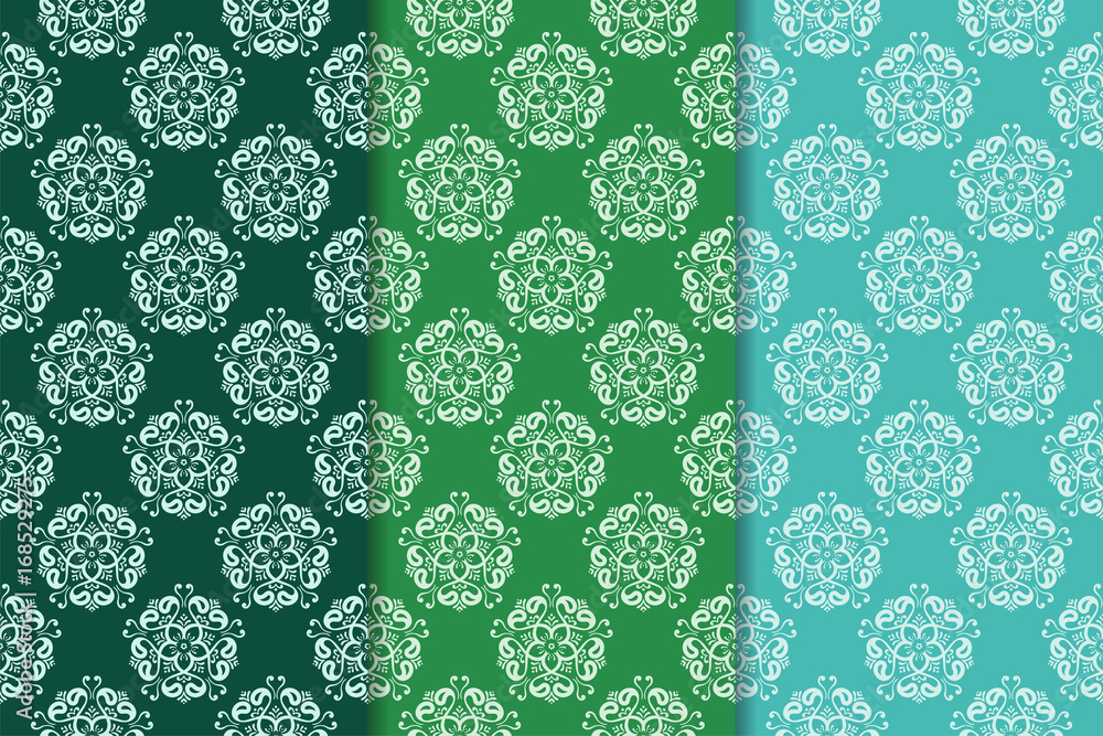 Set of green floral ornaments. Vertical seamless patterns Set of green floral ornaments. Vertical seamless patterns