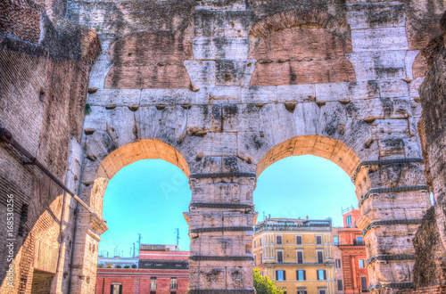 The circular arcs of Colosseum, Flavian Amphitheatre, in Rome, Italy