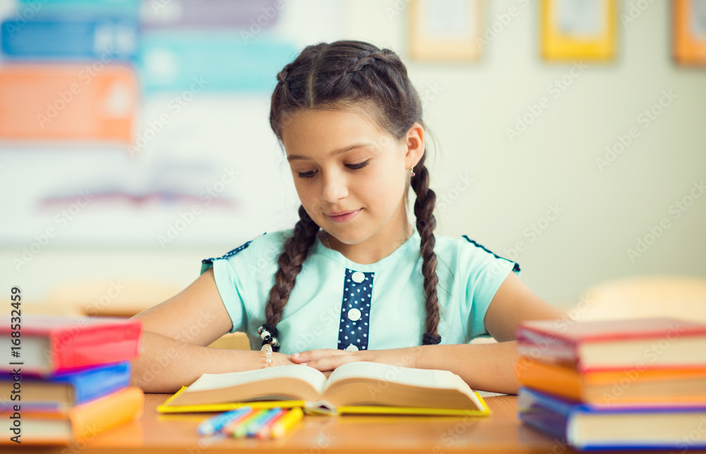 Cute smiling schoolgirl at school Cute smiling schoolgirl at school