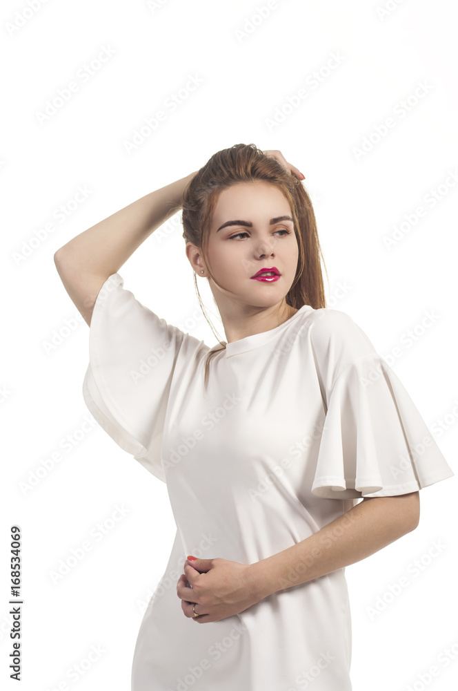 Girl in summer dress plays with hair. Girl in summer dress plays with hair.