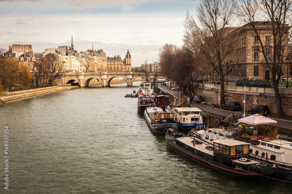 Houseboats on the Seine River in Paris, France, Europe. / Houseboats on River, France