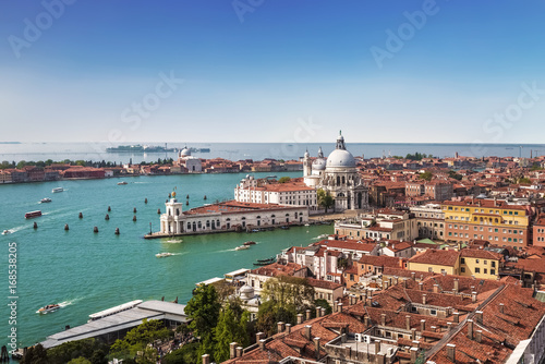 Panoramic view on Venice and the Basilica Santa Maria della Salute from the bell tower of St. Mark's Cathedral, Italy