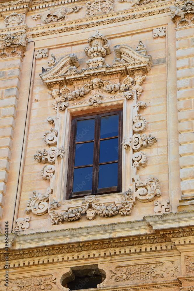 Baroque window of Celestini palace, Lecce, Apulia, Italy
