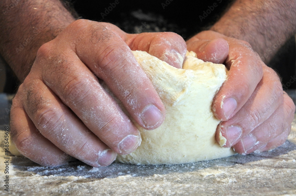 Man knead dough