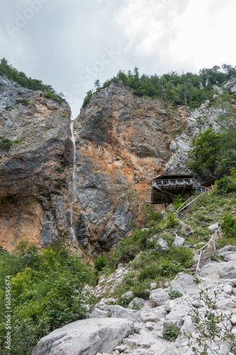 Rinka waterfall with eagles nest in Logar - Logarska valley, Slovenia photo