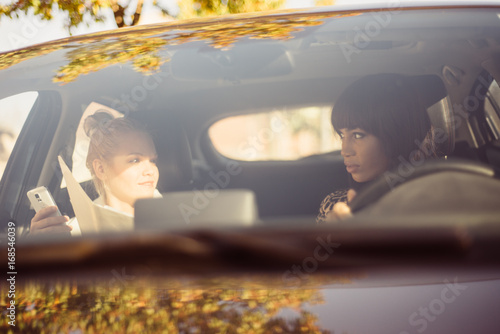 Konstfotografi Co-workers carpooling to work during morning commute