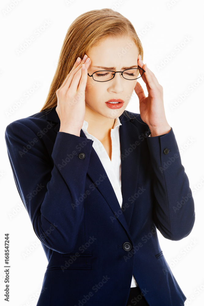 Beautiful business woman is having a headache. Beautiful business woman is having a headache.